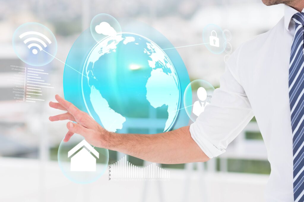 A businessman in a suit touching a globe with his hand, symbolizing global business and connectivity